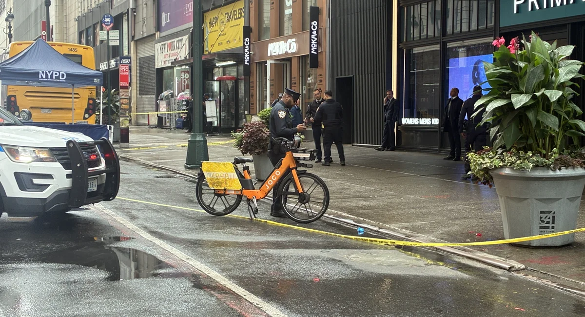 Woman on a JOCO e-bike dies after dump truck collision on West 34th Street
