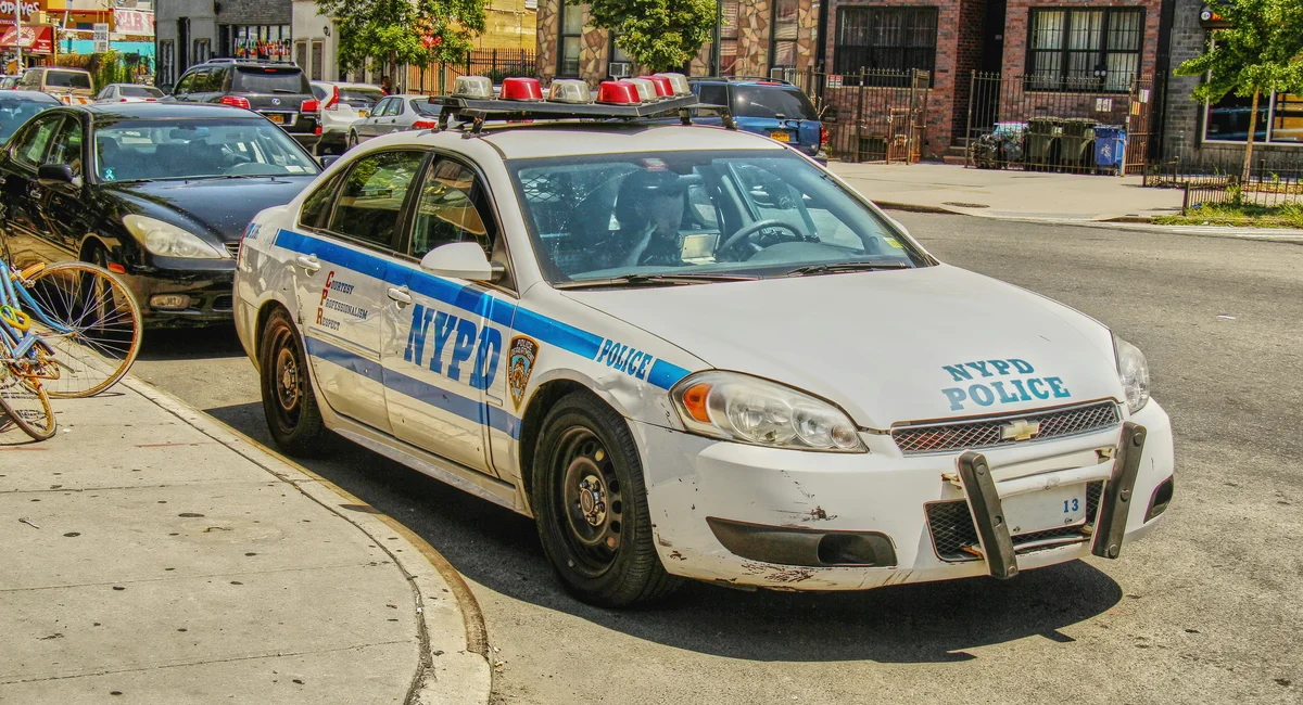 Deli argument on the Lower East Side leaves three men wounded; police seek man in top hat