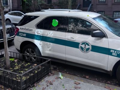 Alternate side ‘shame sticker’ ends up on a Sanitation Department car