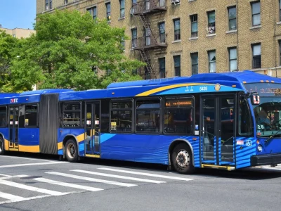 An articulated MTA bus on the Bx1 route in the Bronx