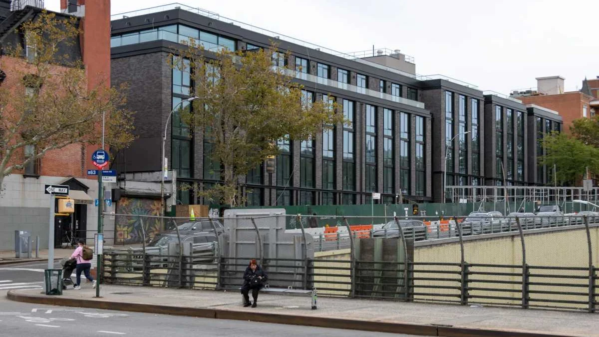 Dark brick apartments are nearly finished where Park Slope’s Grand Prospect Hall stood