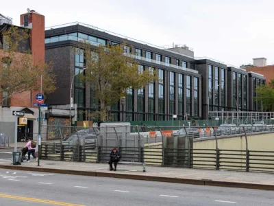 Dark brick apartments are nearly finished where Park Slope’s Grand Prospect Hall stood