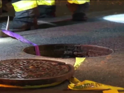 Caller reports three men slipping into the sewer at 1 a.m. in Hamilton Heights