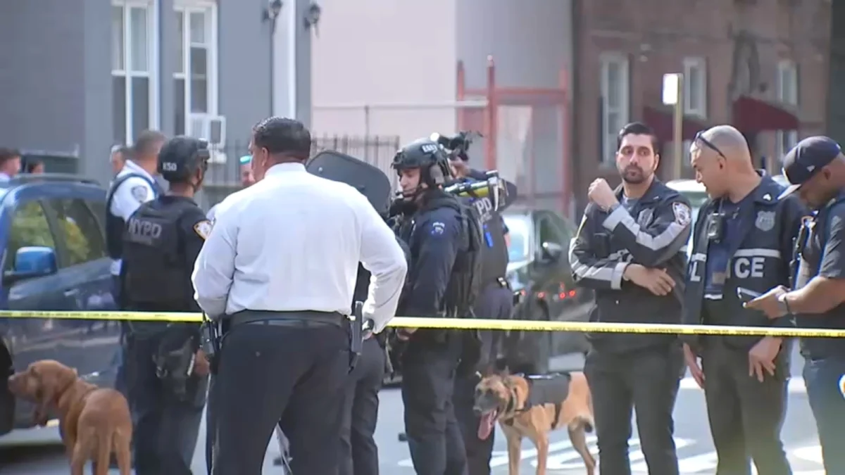 Off-duty detective stabbed in Norwood chases robbery suspects before collapsing