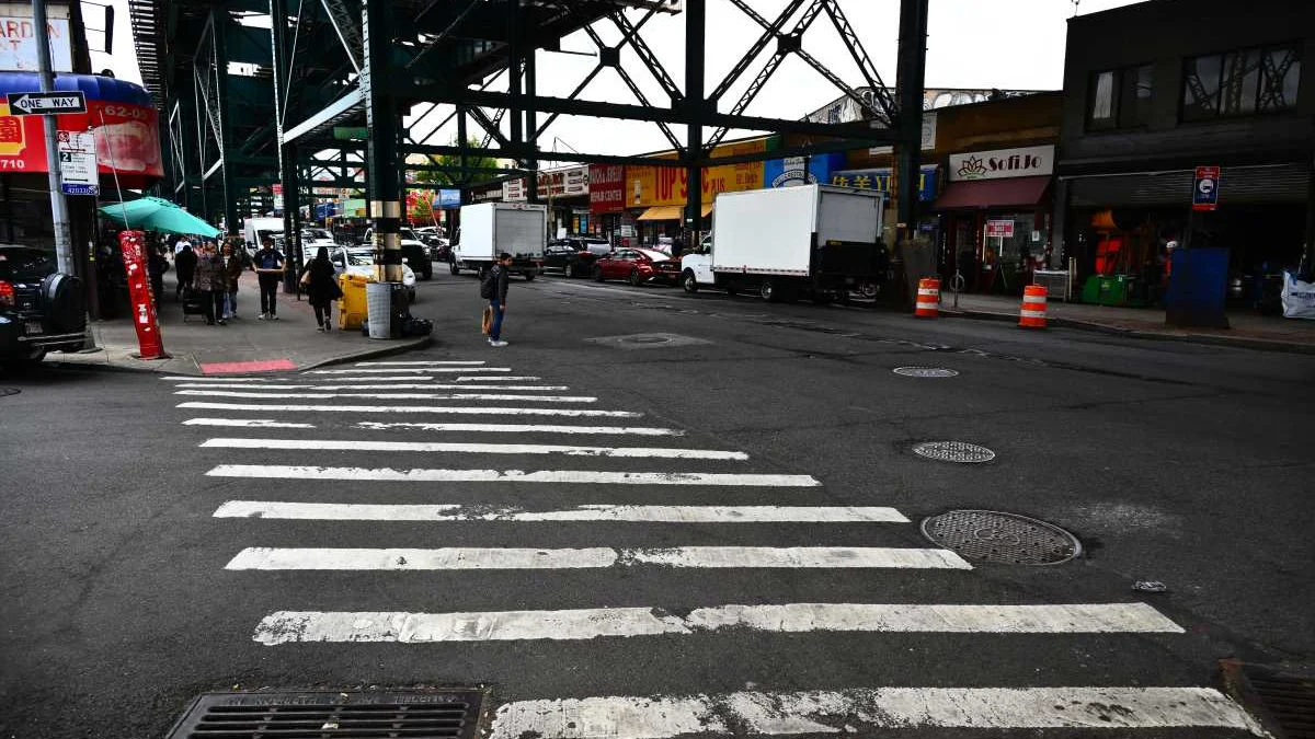 After a fatal truck crash in Woodside, lawmakers press DOT for a walk signal