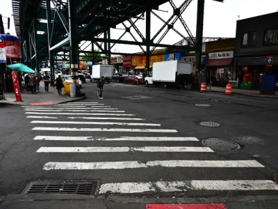 After a fatal truck crash in Woodside, lawmakers press DOT for a walk signal